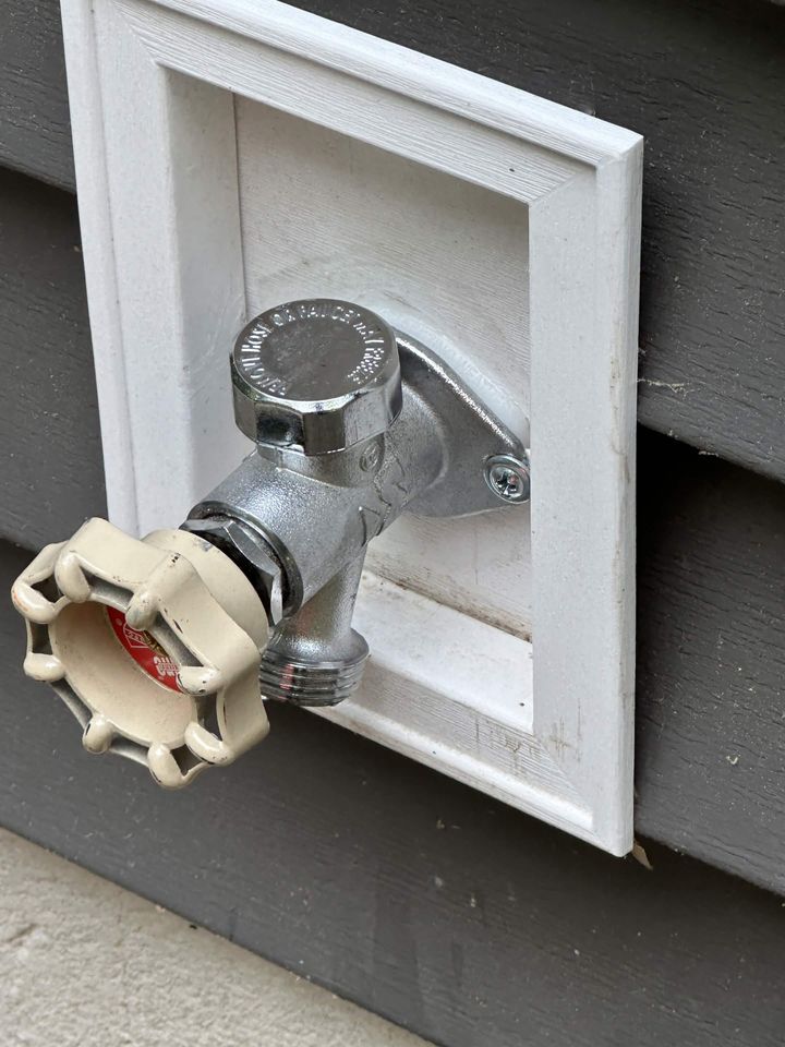 New frost-free outdoor wall hydrant installed with a sealed escutcheon plate